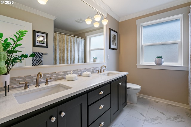 bathroom with a sink, decorative backsplash, marble finish floor, and toilet