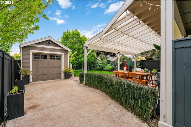 exterior space featuring concrete driveway and fence