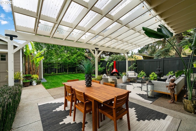 view of patio featuring a fenced backyard, outdoor dining space, and a pergola