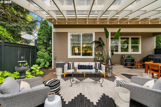 wooden deck featuring an outdoor hangout area, fence, central air condition unit, and a grill
