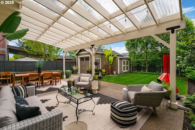 view of patio / terrace featuring an outdoor structure, a pergola, a fenced backyard, an outdoor living space, and outdoor dining space