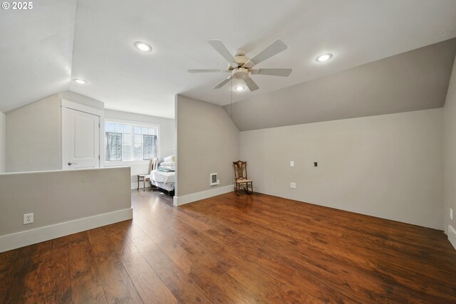 bonus room with ceiling fan, wood finished floors, baseboards, lofted ceiling, and recessed lighting