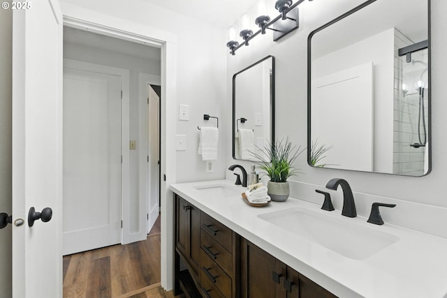 7631 SE Thompson Rd, Milwaukie, OR 97222 - bathroom featuring double vanity and wood finished floors