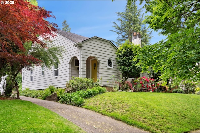 6116 SE 36th Ave, Portland, OR 97202 - view of front of home with a front lawn and a chimney