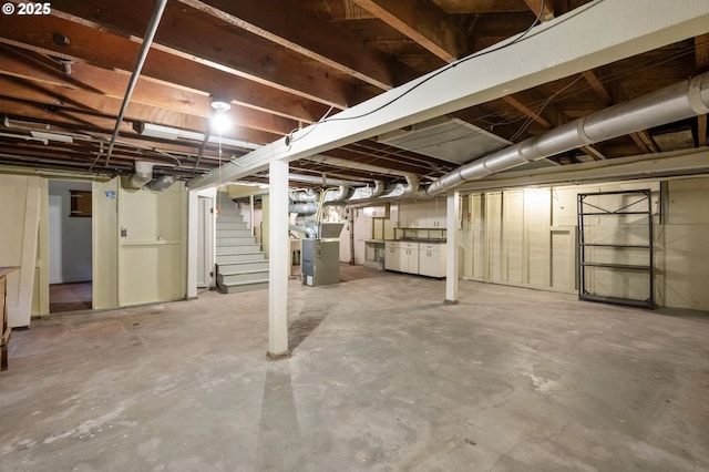 6116 SE 36th Ave, Portland, OR 97202 - unfinished basement featuring stairway and heating unit