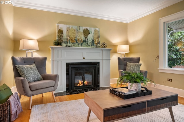 6116 SE 36th Ave, Portland, OR 97202 - living room with a fireplace with flush hearth, crown molding, wood finished floors, and baseboards