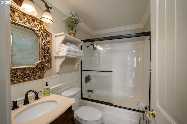 full bathroom with enclosed tub / shower combo, crown molding, vanity, and toilet