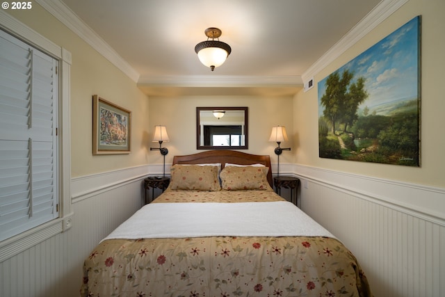 bedroom with ornamental molding