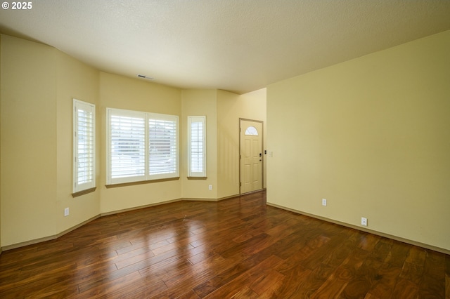 1367 Cramner St, Lafayette, OR 97127 - empty room with dark wood-type flooring and baseboards