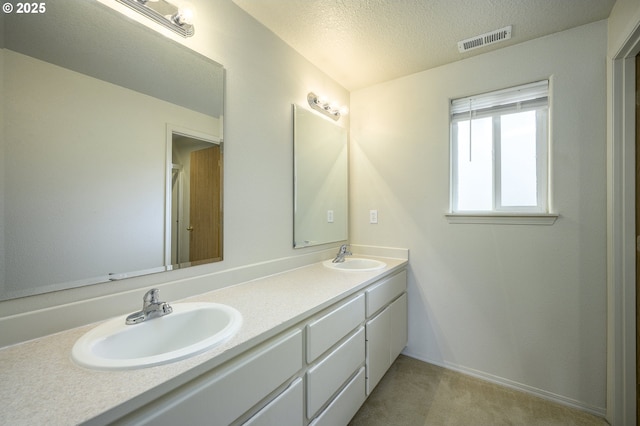 1367 Cramner St, Lafayette, OR 97127 - bathroom with double vanity and a textured ceiling