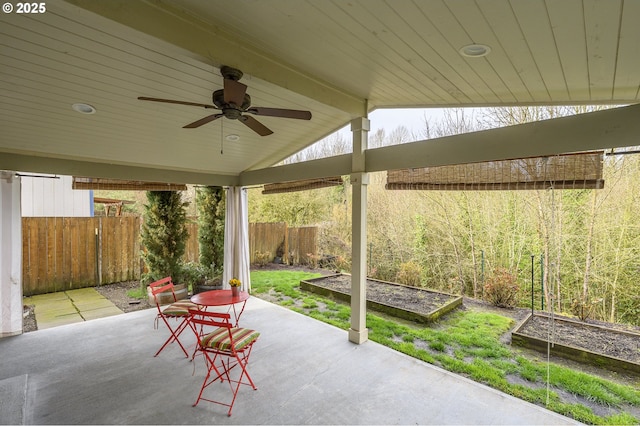 1367 Cramner St, Lafayette, OR 97127 - fenced backyard with a vegetable garden, a patio, and ceiling fan