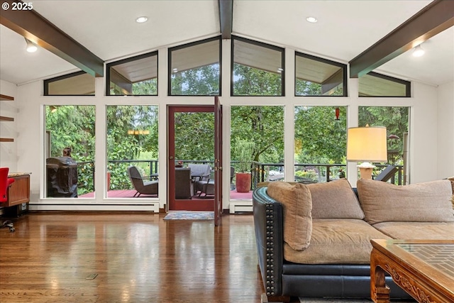 living area with healthy amount of natural light and wood finished floors