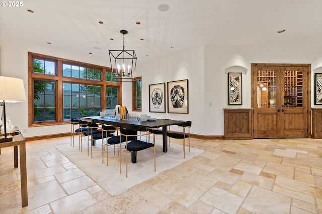 dining space featuring an inviting chandelier