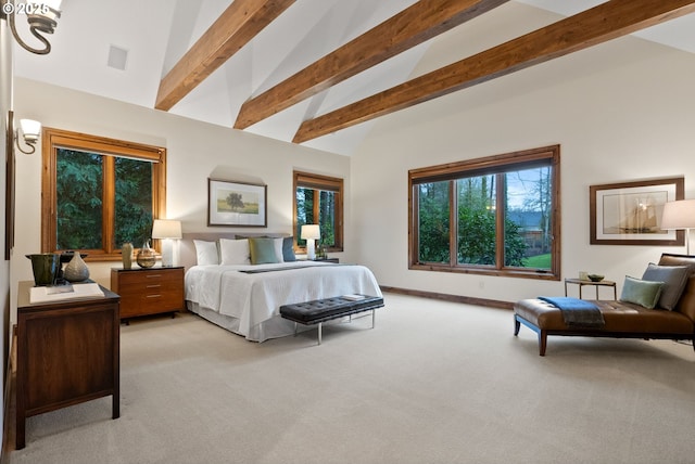 carpeted bedroom with beamed ceiling and high vaulted ceiling