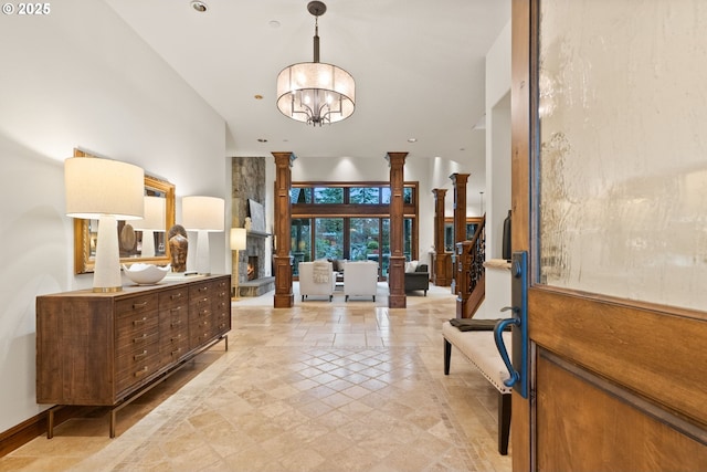 entrance foyer featuring a chandelier and a high ceiling