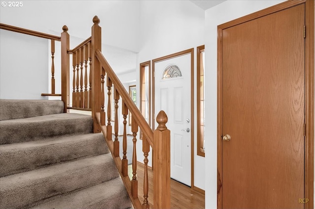 5868 NW Landing Dr, Portland, OR 97210 - entryway featuring stairs and light wood finished floors