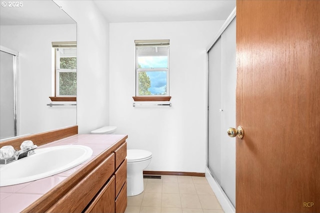5868 NW Landing Dr, Portland, OR 97210 - bathroom with a stall shower, healthy amount of natural light, vanity, and toilet
