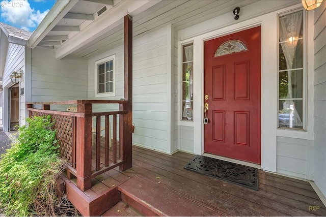 5868 NW Landing Dr, Portland, OR 97210 - doorway to property with a porch