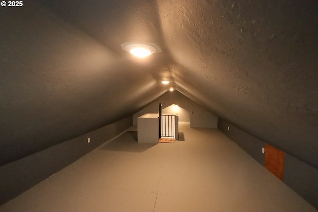 bonus room featuring lofted ceiling