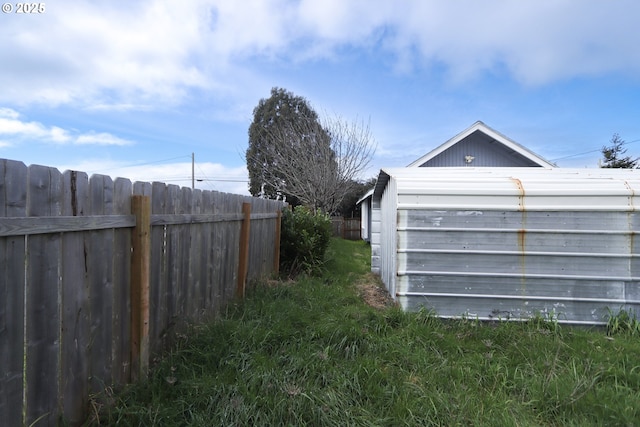 view of yard featuring fence