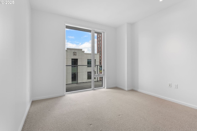 1150 NW Quimby St Unit 608, Portland, OR 97209 - carpeted empty room featuring baseboards