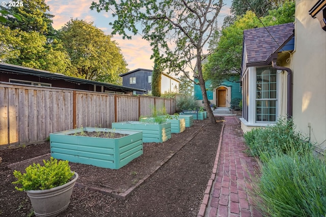 6209 SE 13th Ave, Portland, OR 97202 - fenced backyard with a garden