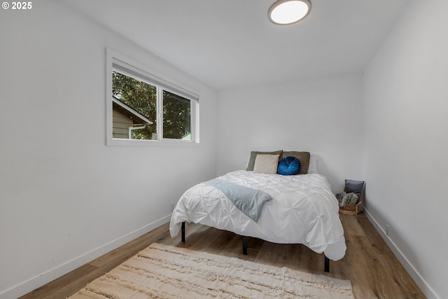 605 SE 104th Ave, Vancouver, WA 98664 - bedroom featuring baseboards and wood finished floors