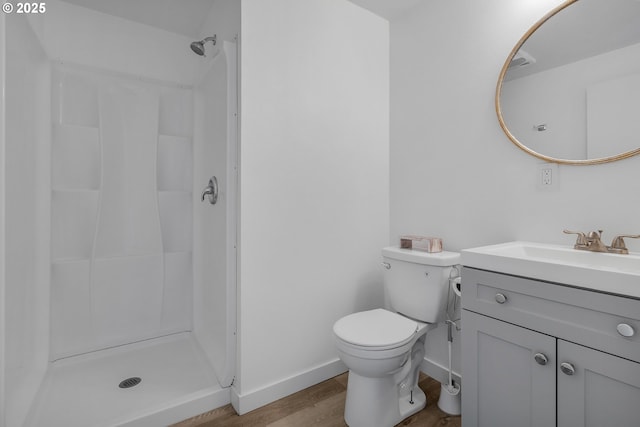 605 SE 104th Ave, Vancouver, WA 98664 - full bathroom featuring a shower stall, vanity, and wood finished floors