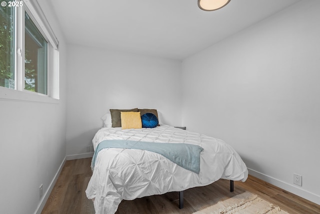 605 SE 104th Ave, Vancouver, WA 98664 - bedroom featuring baseboards and wood finished floors