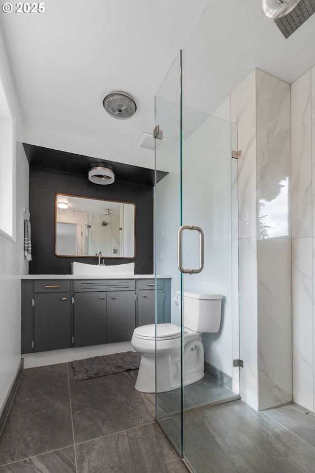 605 SE 104th Ave, Vancouver, WA 98664 - bathroom featuring a marble finish shower and vanity