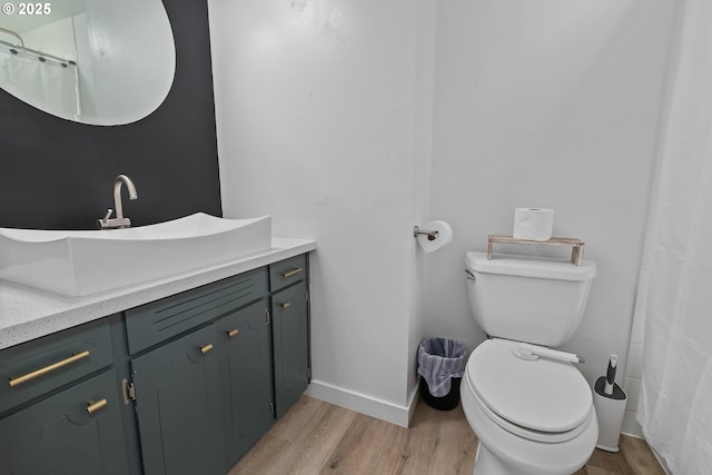 605 SE 104th Ave, Vancouver, WA 98664 - bathroom with vanity, wood finished floors, and curtained shower