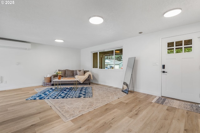 605 SE 104th Ave, Vancouver, WA 98664 - entryway featuring a wall unit AC and wood finished floors