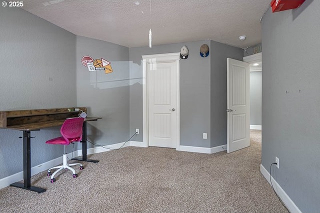 2021 Pikes Pass Ct, Salem, OR 97306 - office area featuring a textured ceiling, carpet floors, and baseboards