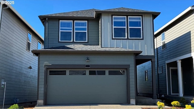 2100 36th Ave, Forest Grove, OR 97116 - view of front facade featuring a garage, roof with shingles, board and batten siding, and driveway
