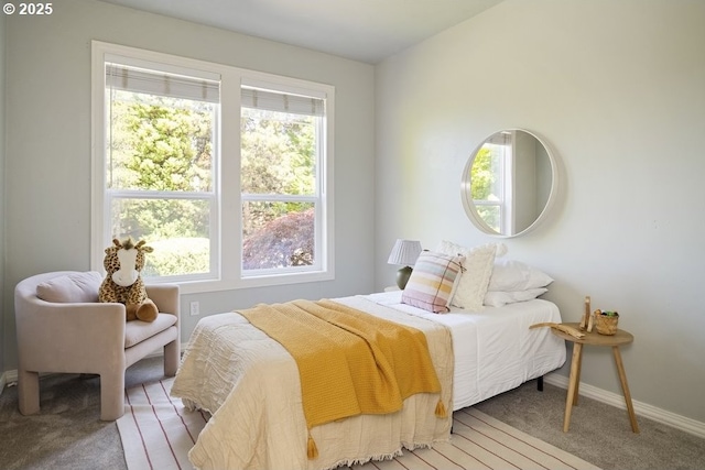 13037 SW Ascension Dr, Portland, OR 97223 - carpeted bedroom with multiple windows and baseboards