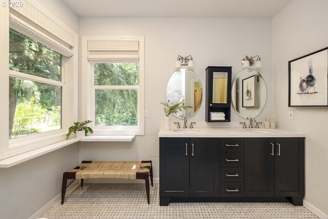 13037 SW Ascension Dr, Portland, OR 97223 - bathroom featuring double vanity and baseboards