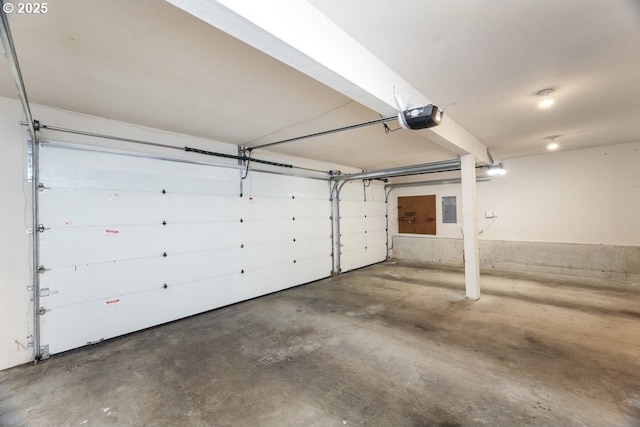 13037 SW Ascension Dr, Portland, OR 97223 - garage with electric panel and a garage door opener