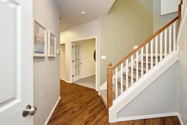 13037 SW Ascension Dr, Portland, OR 97223 - stairs featuring wood finished floors
