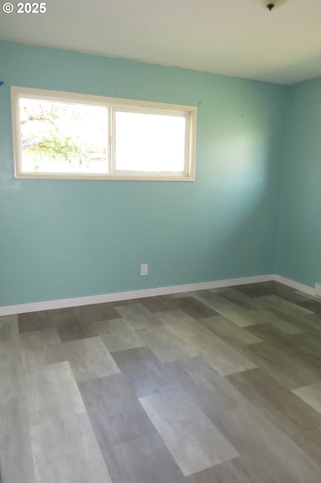 1817 Shamrock Dr, Centralia, WA 98531 - spare room featuring plenty of natural light and baseboards