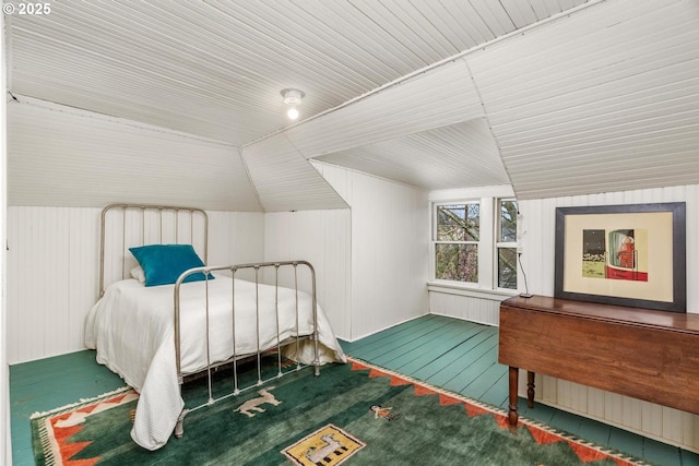 bedroom featuring lofted ceiling