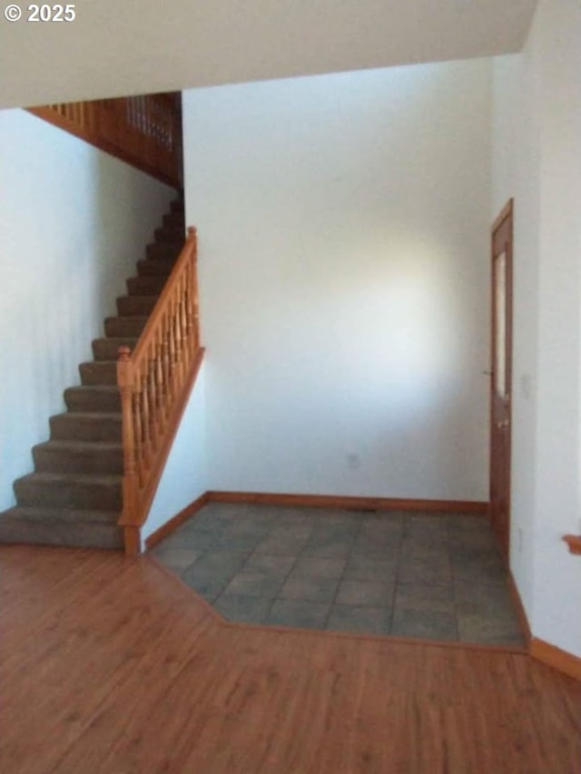 931 SW Joseph Ave, Hermiston, OR 97838 - stairs featuring wood finished floors and baseboards