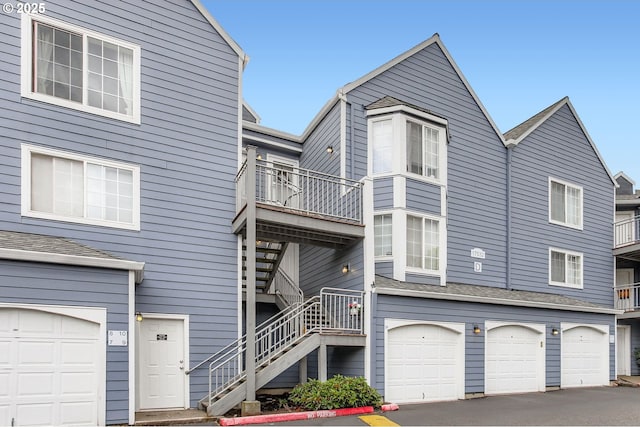 17532 NW Springville Rd Unit D8, Portland, OR 97229 - view of front of house with stairway and an attached garage