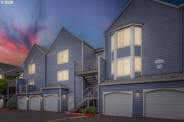 17532 NW Springville Rd Unit D8, Portland, OR 97229 - view of property with stairway and a garage