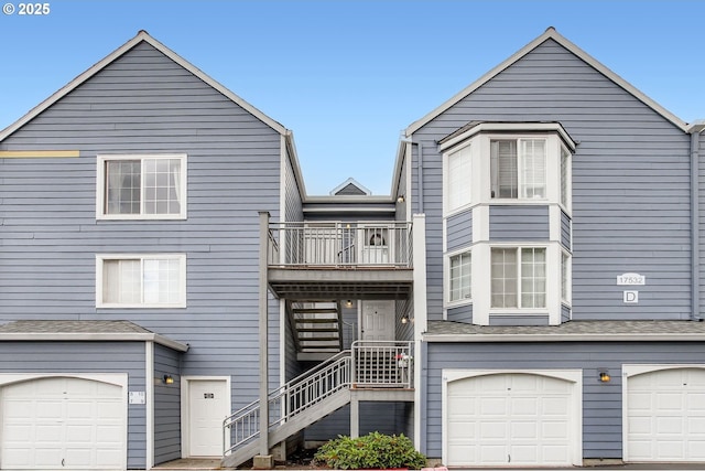 17532 NW Springville Rd Unit D8, Portland, OR 97229 - view of front facade with a balcony and a garage