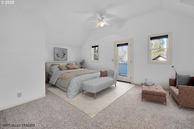 bedroom featuring access to outside, light colored carpet, ceiling fan, and vaulted ceiling