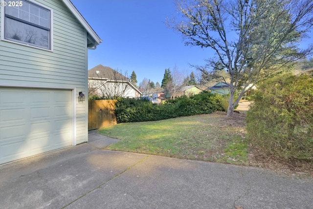 view of yard featuring a garage