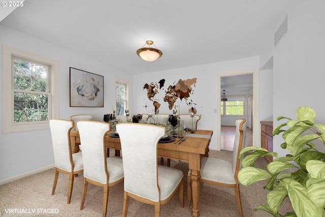 view of carpeted dining room