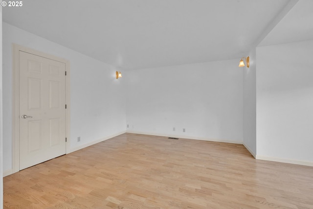 unfurnished room featuring light wood-type flooring