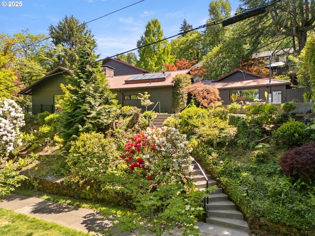 2930 NW Quimby St, Portland, OR 97210 - view of front of house featuring stairs and solar panels