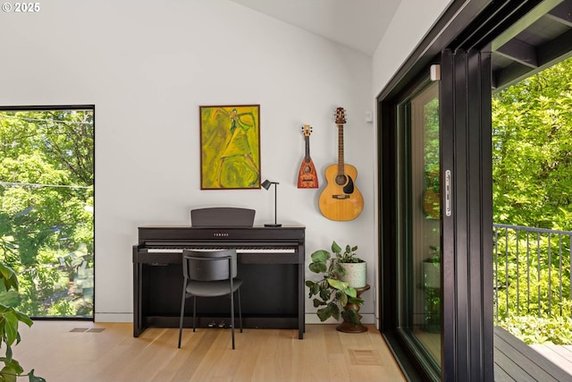 2930 NW Quimby St, Portland, OR 97210 - living area featuring lofted ceiling and wood finished floors